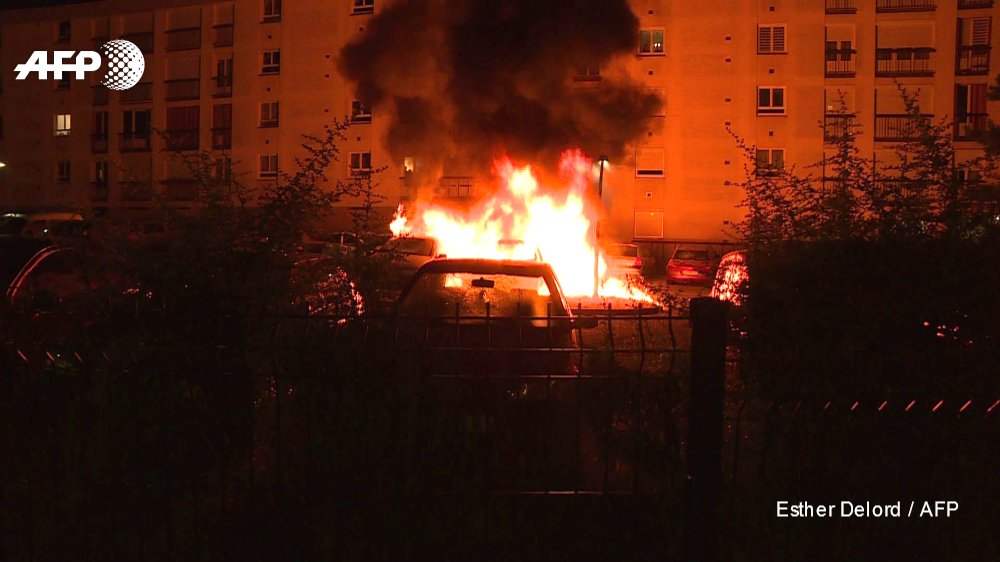 Dozens of cars and several buildings were set alight in Nantes, western France, in a third night of rioting over the fatal police shooting of a young man    