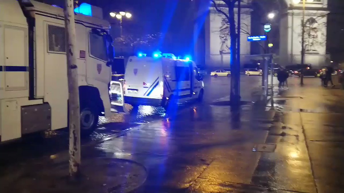Still a large police presence at the Arch de Triomphe in Paris   
