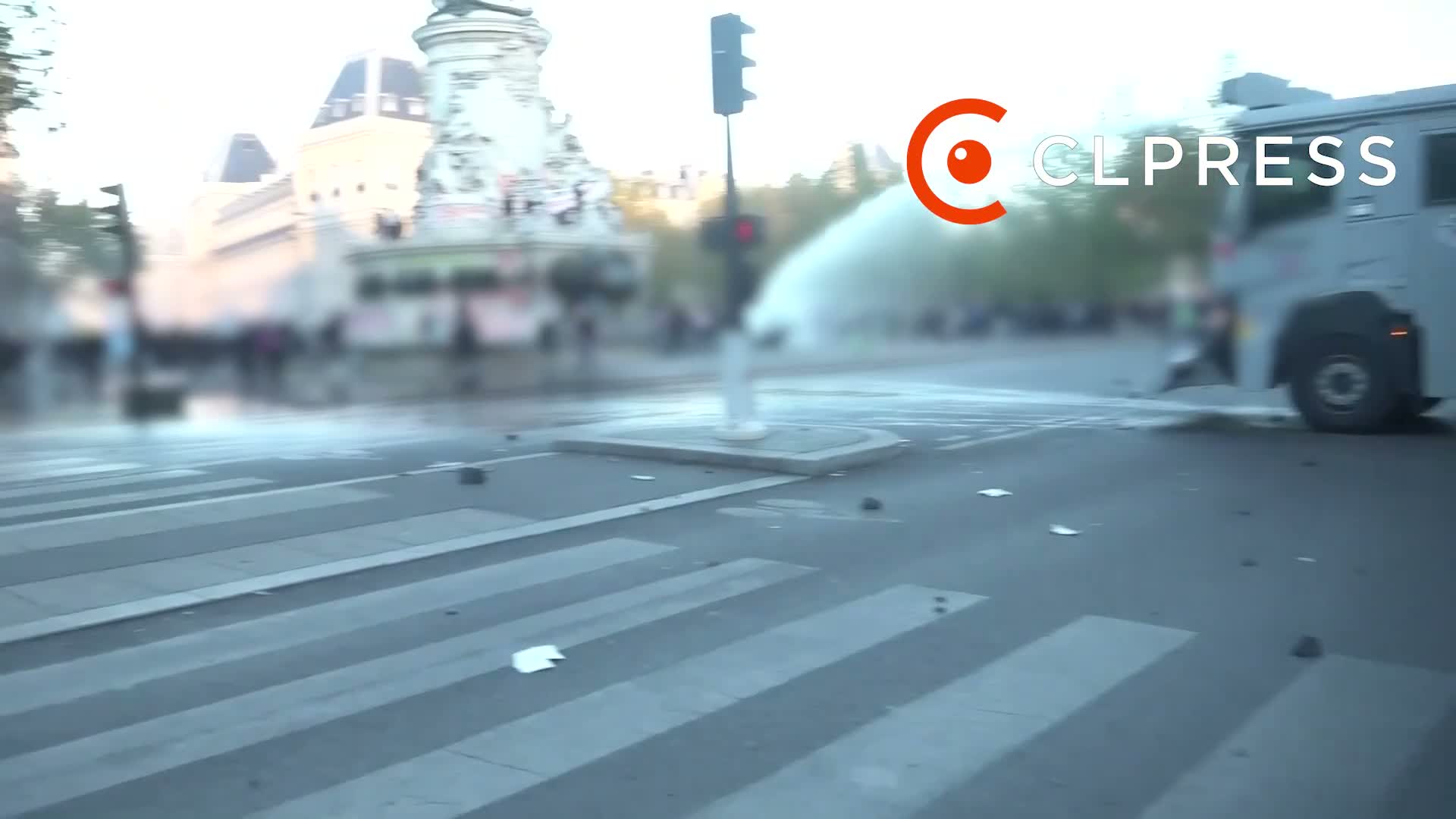 Place de la République: Police uses water cannons.